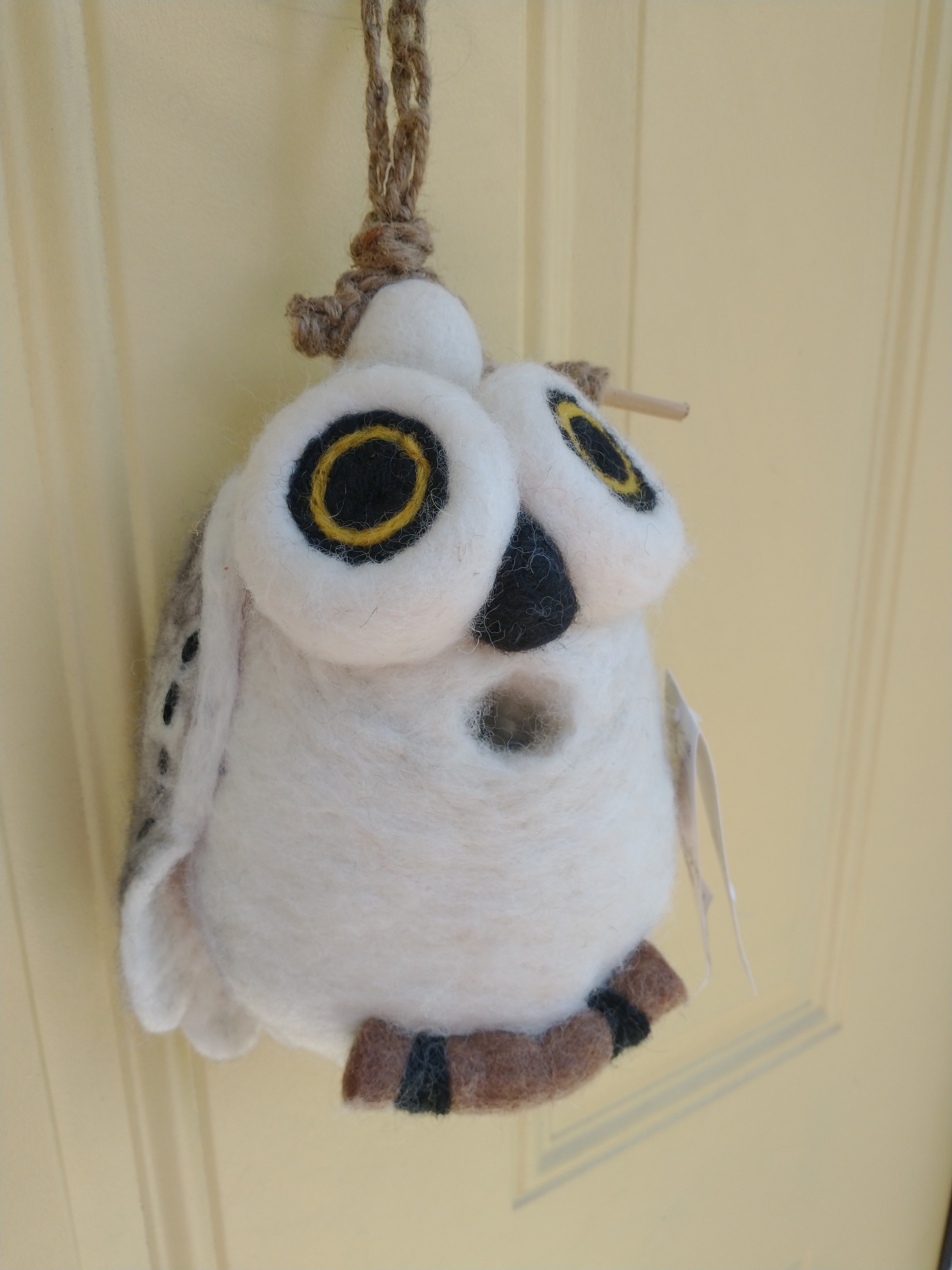 Owl-shaped felted wool birdhouse